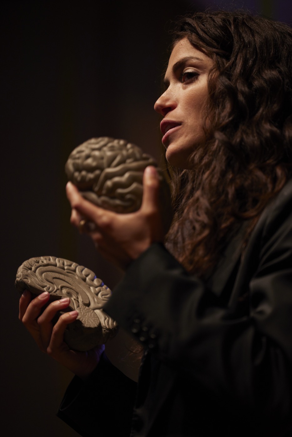 Fran teaching, holding brain models
